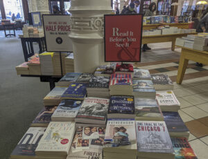 A display of books at Barnes & Noble with a sign reading, "read it before you see it."