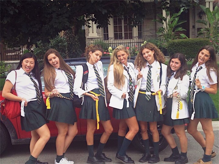 Author and her six friends dressed in their school uniforms.