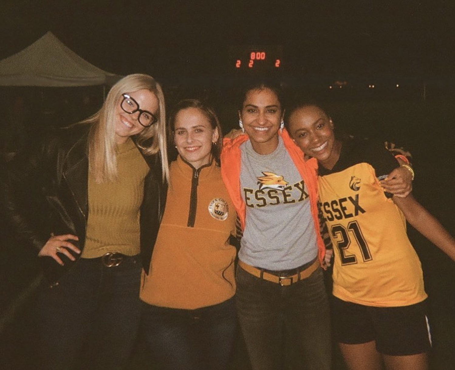 Four college girls pose for a picture